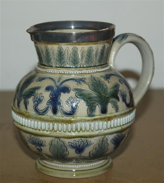 Doulton lambeth stoneware jug with silvered mounted rim